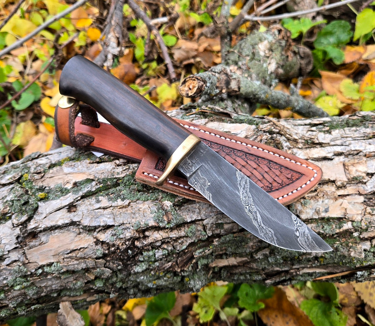 Double-Twist Damascus Drop Point