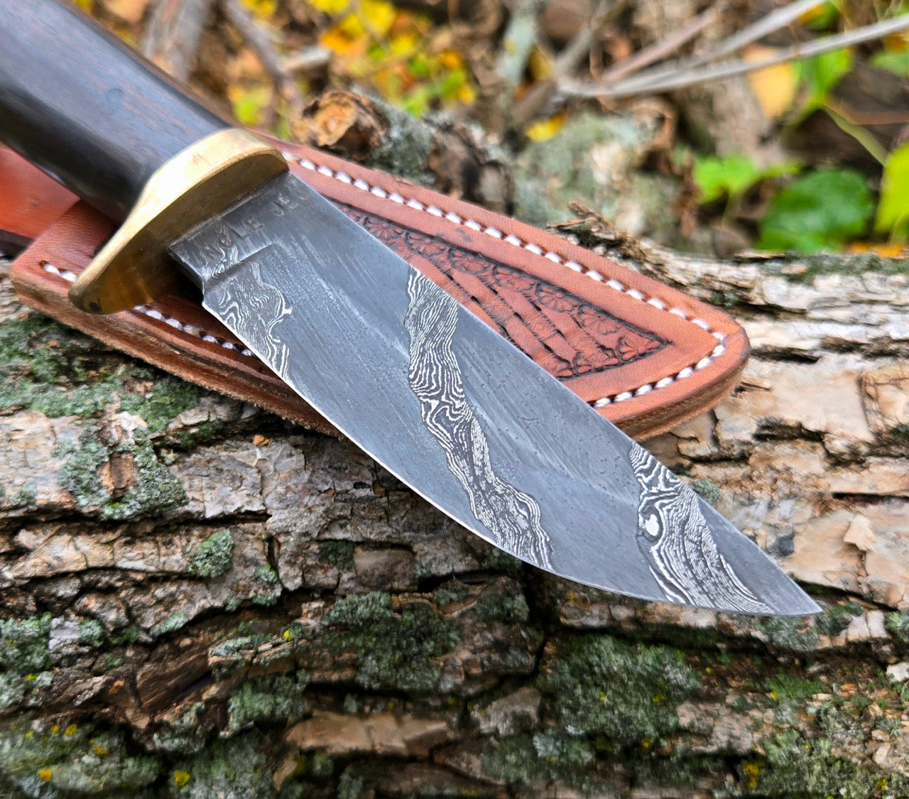 Double-Twist Damascus Drop Point